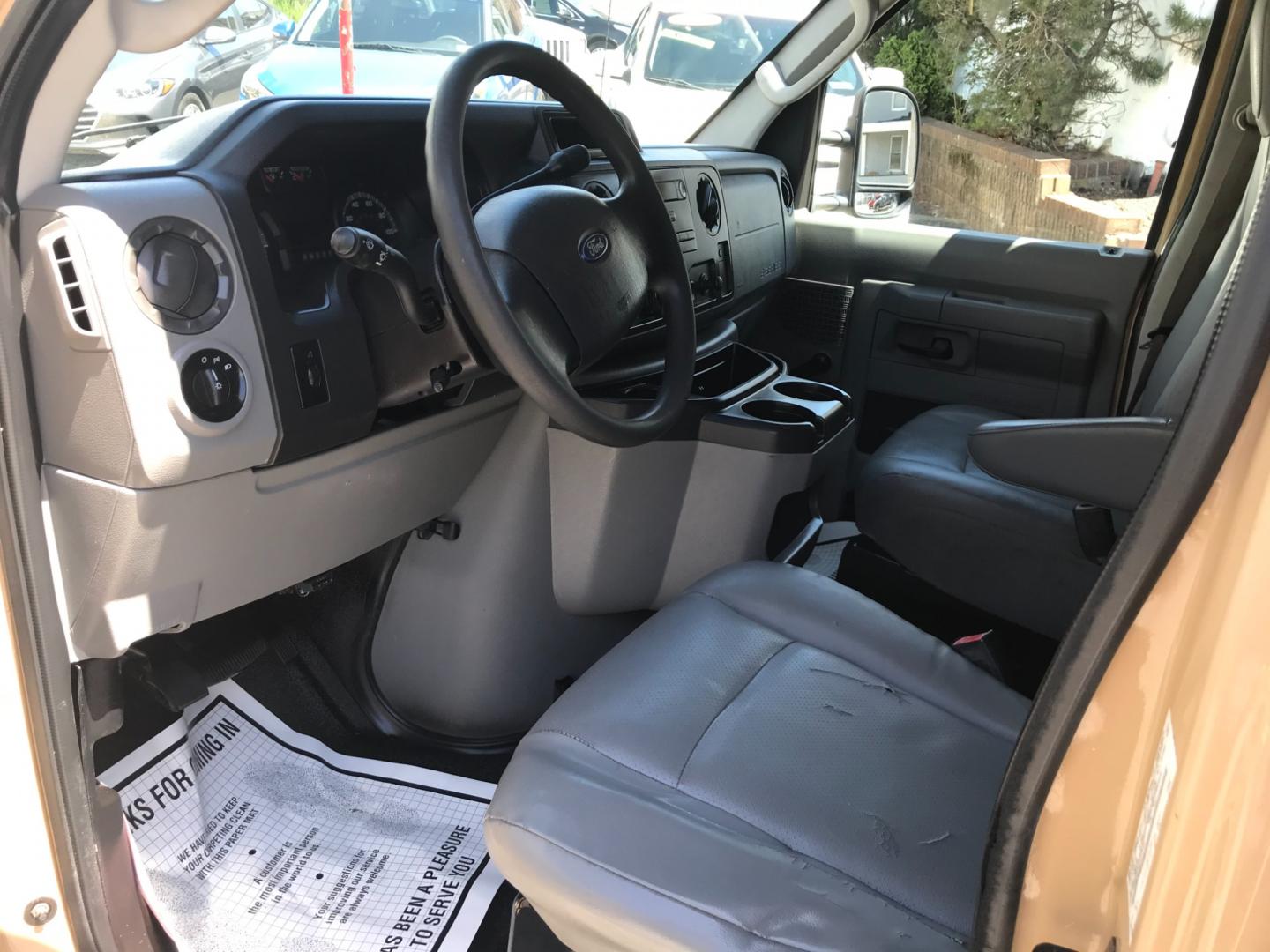 2011 Tan /Gray Ford E-Series Van E250 (1FTNE2EW5BD) with an 4.8 V8 engine, Automatic transmission, located at 577 Chester Pike, Prospect Park, PA, 19076, (610) 237-1015, 39.886154, -75.302338 - 2011 Ford E250 Cargo Van: Ladder racks, shelving, heavy duty partition, power inverter, fully metal body, FLEET MAINTAINED, runs LIKE NEW! This vehicle comes inspected and has been given a bumper to bumper safety check. It is very clean, reliable, and well maintained. We offer a unique pay plan t - Photo#8